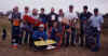 Grupo de participantes, jueces y otros.